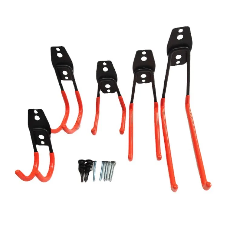 Assorted orange wall-mounted garage hooks